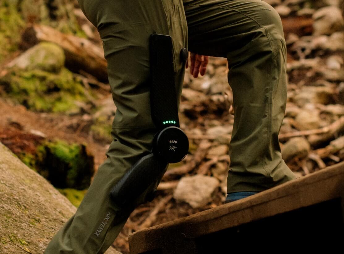 Close-up of a MO/GO leg enhancer worn while hiking