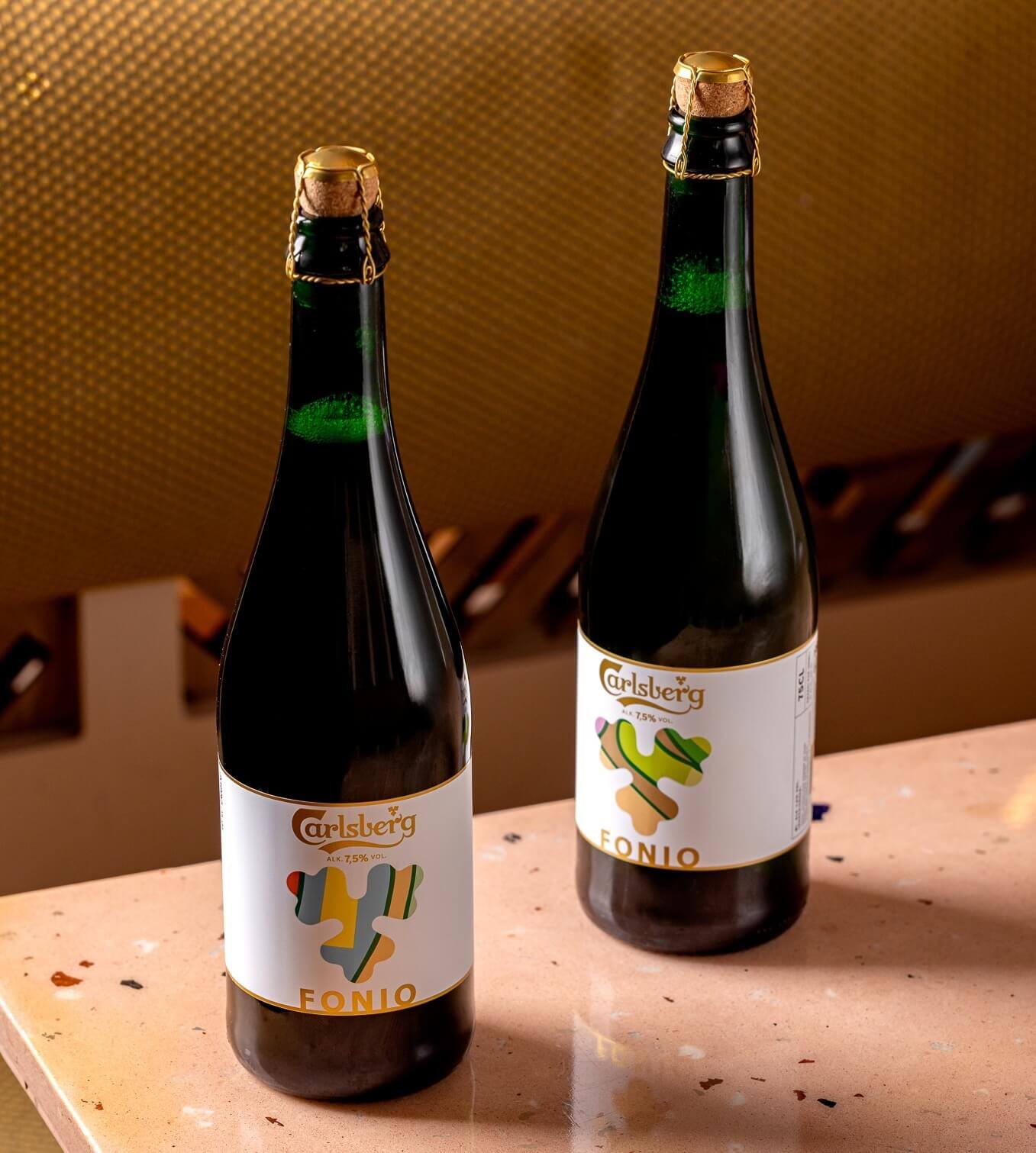 Two corked bottles of Carlsberg Fonio Lager 