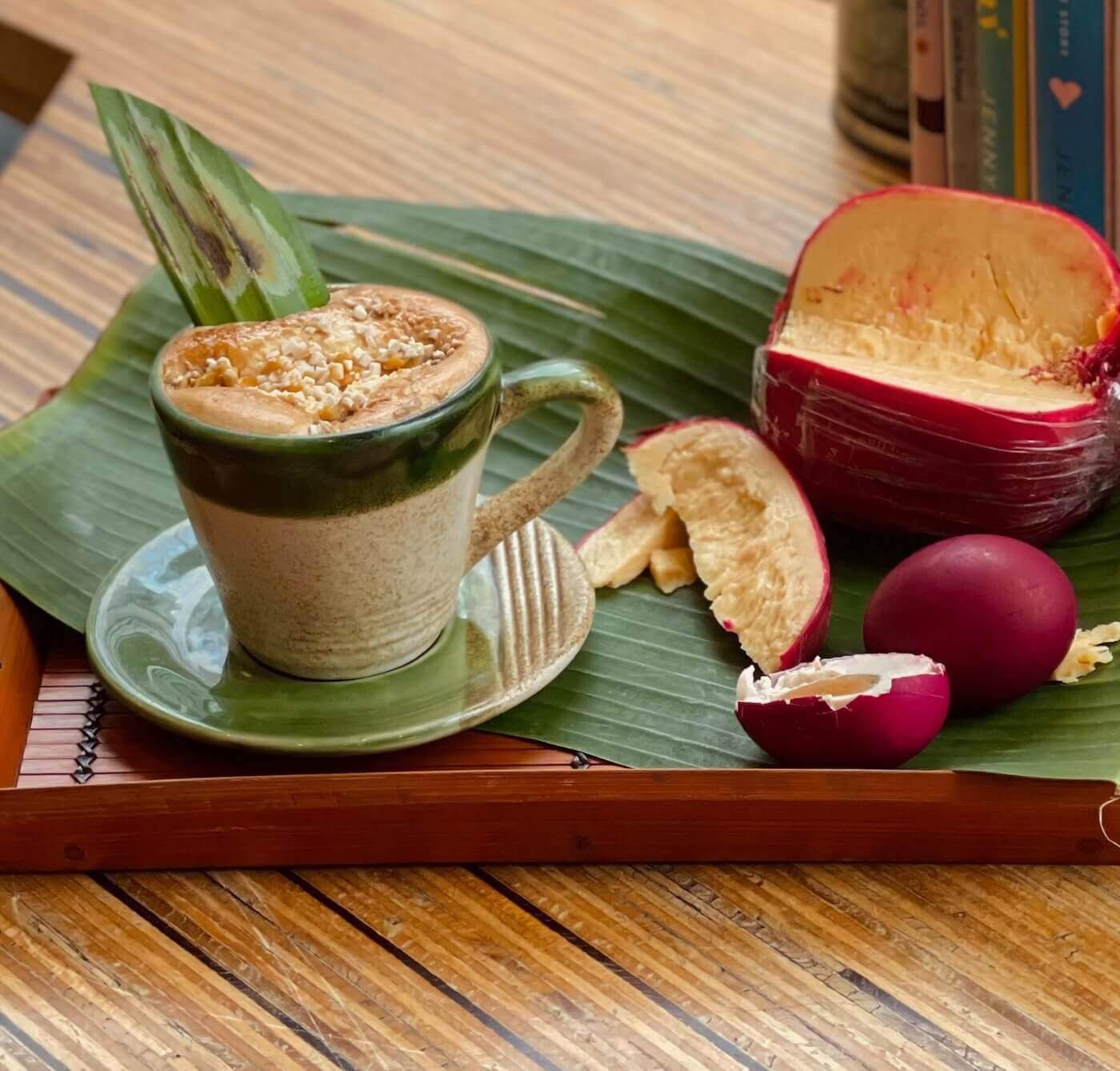 A bibingka latte alongside queso de bola and salted egg 