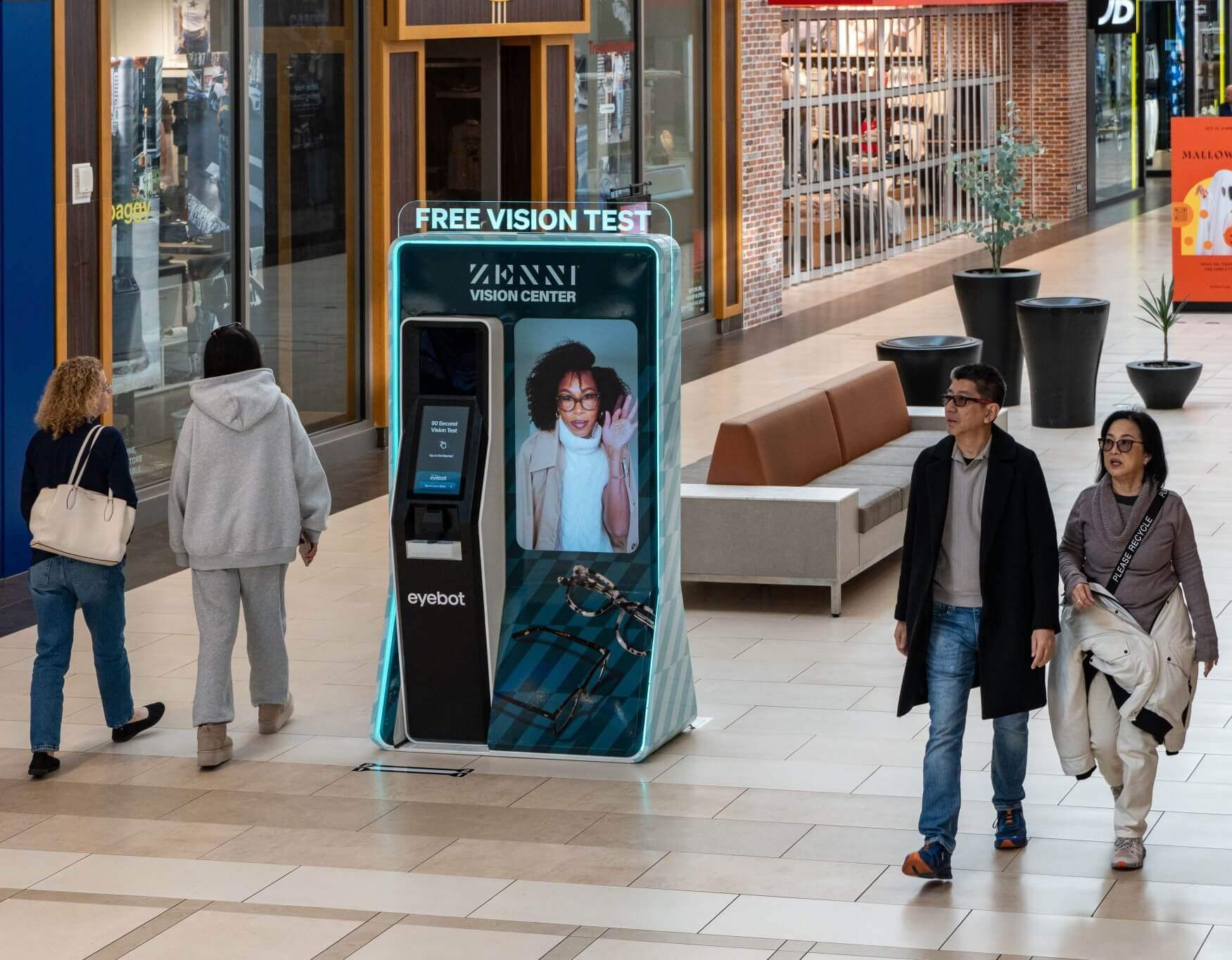 A Zenni kiosk by Eyebot, offering free vision tests in a shopping mall 